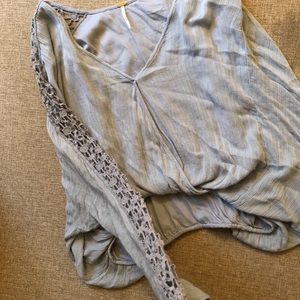 Free people flowy top with knit pattern on arms